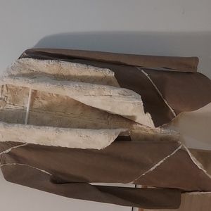 A very nice soft and comfortable jacket that will look beautiful  with anything!